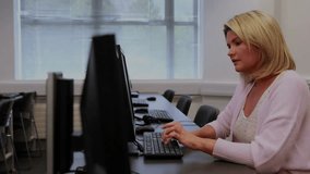 Woman typing at workstation and initiating floating code overlays while processing technology data. Technology, data, programming, concentration, digital, workspace, innovation - Powered by Shutterstock - Get 15% off with code: PIKWIZARD15