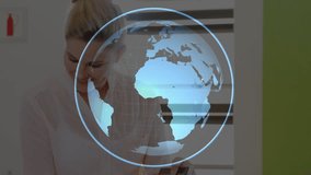 Teacher raising tablet initiating globe rotation while student mirroring taps for geography. Education, technology, digital, innovation, learning, classroom, collaboration - Powered by Shutterstock - Get 15% off with code: PIKWIZARD15