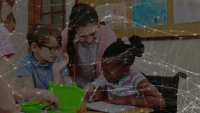 Noticing student hesitation, female teacher guiding writing at desk next to wheelchair in education. Educator, student support, classroom, mentorship, inclusiveeducation, learning, instructional - Powered by Shutterstock - Get 15% off with code: PIKWIZARD15