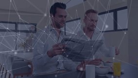 Left man scrolling tablet eating cereal while right stirring coffee and sharing smile for health. Casual, friendship, homey, warm, candid, lifestyle, modern - Powered by Shutterstock - Get 15% off with code: PIKWIZARD15