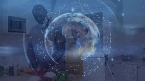 Woman passing knife to son sparking holographic data globe above kitchen showing global network. Cooking, technology, connectivity, digital, modern, family, innovation - Powered by Shutterstock - Get 15% off with code: PIKWIZARD15