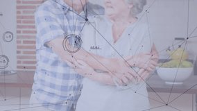 Senior couple sharing kitchen embrace initiating warm tech data visuals drifting across screen. Romance, affection, companionship, intimacy, lifestyle, heartfelt, togetherness - Powered by Shutterstock - Get 15% off with code: PIKWIZARD15