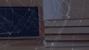 network mesh drifting and weaving around stack with mug of pencils and scissors before chalkboard. Technology, innovation, connectivity, education, learning, digital, modern - Powered by Shutterstock - Get 15% off with code: PIKWIZARD15