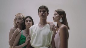 Professional women and man modeling photoshoot in a studio setting - Powered by Shutterstock - Get 15% off with code: PIKWIZARD15