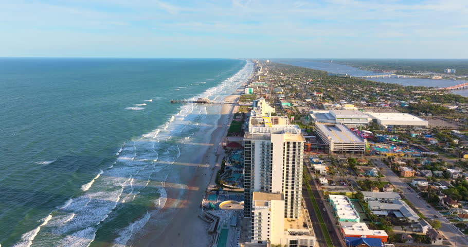 Cityscape of Daytona Beach, Florida. Luxury coastal living with hotels, condominiums and tourist amenities in developed seaside town.