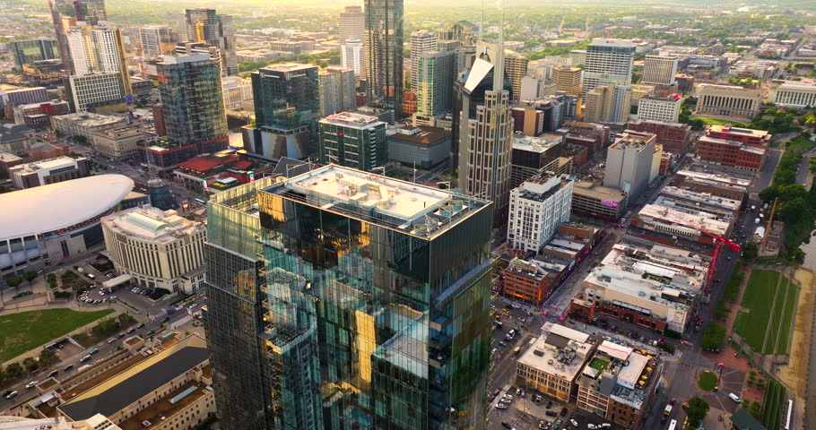 Nashville city urban environment in Tennessee, USA. Evening view from above of skyscraper buildings in downtown district. American metropolitan area with business financial district.