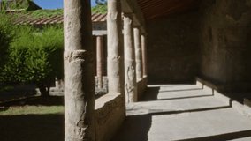 Blurred pompeii stone colonnade with shallow bokeh and soft defocused ruins outdoor; backdrop copyspace backplate. - Powered by Shutterstock - Get 15% off with code: PIKWIZARD15