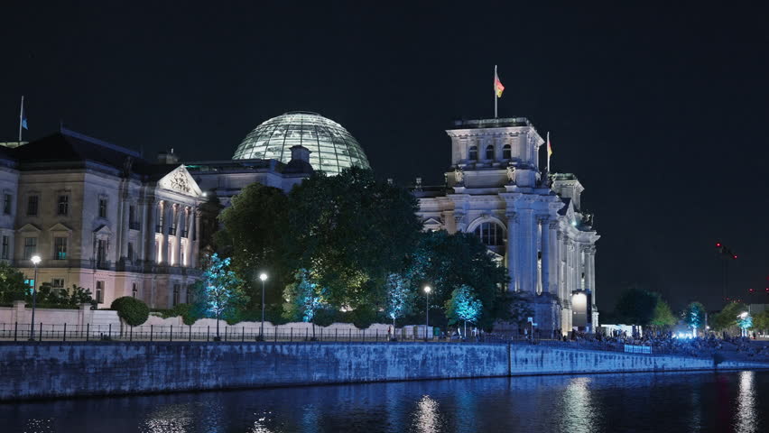 A view from the embankment of Berlin at night, overlooking famous architectural landmarks. Berlin,Germany