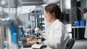 Exhausted laboratory scientist rubbing eyes, tired of evaluating genetic markers using PC. Weary expert fatigued by DNA strand mapping at computer desk, sighing, camera B - Powered by Shutterstock - Get 15% off with code: PIKWIZARD15