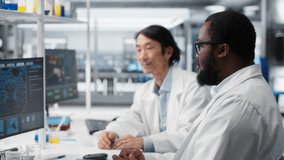 Multiracial engineers using scientific gear in research facility used for complex experiments. Diverse team of scientists in high tech laboratory doing genetics research using lab equipment, camera B - Powered by Shutterstock - Get 15% off with code: PIKWIZARD15