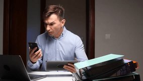 Businessman multitasking with multiple devices experiencing information overload - Powered by Shutterstock - Get 15% off with code: PIKWIZARD15