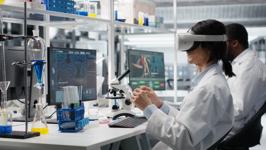 Laboratory scientist using virtual reality tech to process DNA patient data for clinical research. Research facility expert uses VR headset gear to do lab genetic analysis diagnostics, camera B