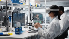 Laboratory scientist using virtual reality tech to process DNA patient data for clinical research. Research facility expert uses VR headset gear to do lab genetic analysis diagnostics, camera B - Powered by Shutterstock - Get 15% off with code: PIKWIZARD15
