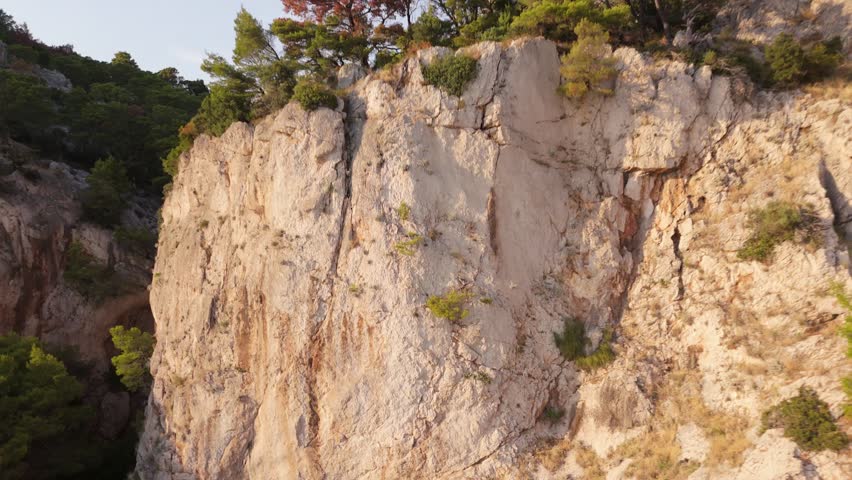 Epic Drone Reveal of Croatian Coastline: Flying Back from Cliff with Parallax