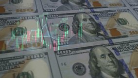 US dollar banknotes stacks over digital screen with exchange chart, depreciation and volatility concept, close-up perspective view - Powered by Shutterstock - Get 15% off with code: PIKWIZARD15