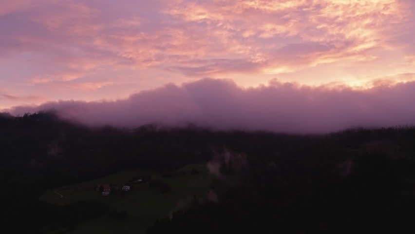 Mystical Fog and Clouds Rolling Over Austrian Mountains – 4K Aerial Drone Footage in Autumn at Sunset