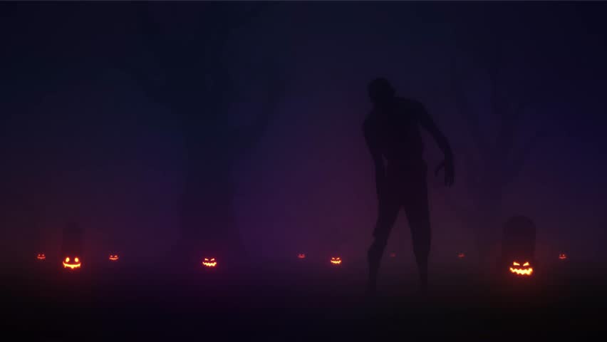Halloween cemetery at night with foggy graves and scary zombies. Halloween video, pumpkins and skeletons in the cemetery at night