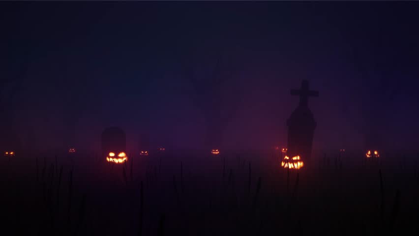 Halloween cemetery at night with foggy graves and scary zombies. Halloween video, pumpkins and skeletons in the cemetery at night