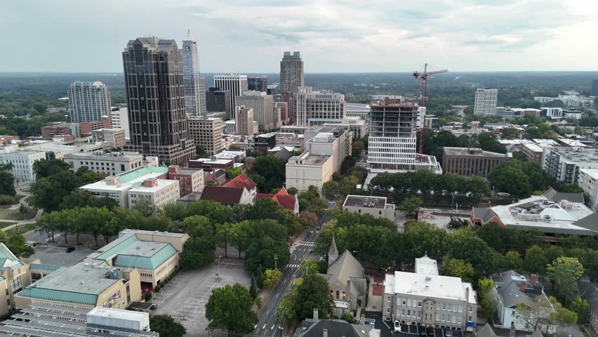 Downtown Raleigh city center aerial with construction and skyline