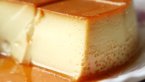 Closeup of a Delicious Caramel Pudding 4k - Powered by Shutterstock - Get 15% off with code: PIKWIZARD15