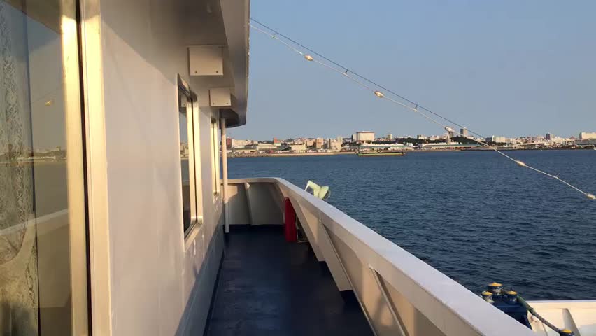 Watching the sunset over the sea from a cruise ship