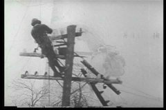 1940s - Archival black and white film highlights the efforts of telephone installers and line repairmen that keep the nation's telephone system running.
