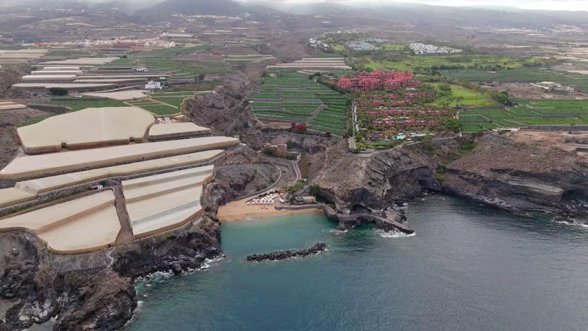 Atlantic ocean, waves, cliffs, sandy beach, banana farm, accommodation, aerial view