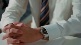 Close up of businessman’s wristwatch and hands in office. Concept of time management, appointments, deadlines, reminders, and schedule planning with waiting and productivity theme. - Powered by Shutterstock - Get 15% off with code: PIKWIZARD15