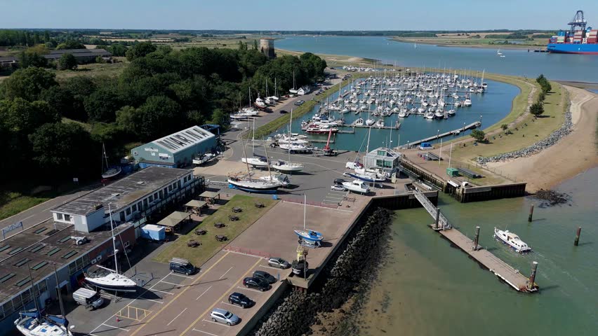 Drone aerial perspective of Shotley marina harbour, small yachts and vessels docked in port near Felixstowe and Harwich , North Sea, United Kingdom, Europe summer 