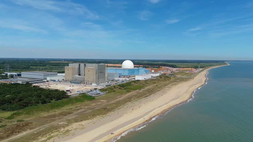 Aerial drone view of Sizewell B nuclear power plant, electrical energy generation fission technology and sub station supply atomic power, East Coast North Sea, United Kingdom, Europe. 