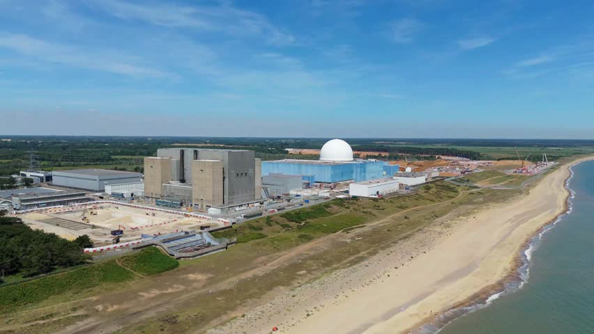 Aerial drone view of Sizewell B nuclear power plant, electrical energy generation fission technology and sub station supply atomic power, East Coast North Sea, United Kingdom, Europe. 