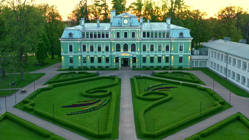 Exterior View Of Kokmuiza Manor With Ornamental Garden In Koceni, Valmiera, Vidzeme, Latvia. - aerial shot