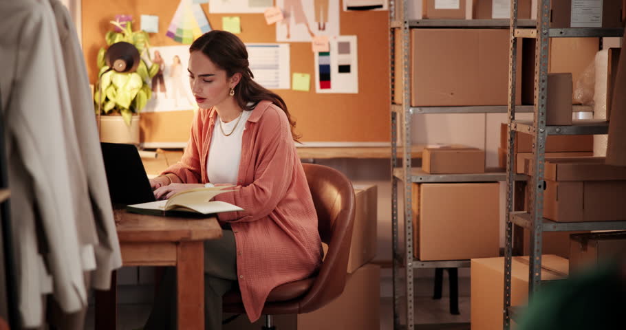 Woman, check box or typing with laptop for ecommerce, online notification or shipping order at night. Person, verify package with customer info on computer for retail sale, export or fashion business