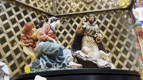 Nativity scene with figurines of Mary, Joseph, baby Jesus. Ceramic sculptures, birth of Christ and spirit of Christmas. - Powered by Shutterstock - Get 15% off with code: PIKWIZARD15
