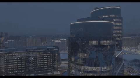 Drone Flying above Modern Glass Towers Winter