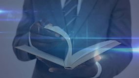 Business professional flipping book pages to visualize digital network graphics expanding outward. Corporate, technology, innovation, networking, futuristic, abstract, digital - Powered by Shutterstock - Get 15% off with code: PIKWIZARD15