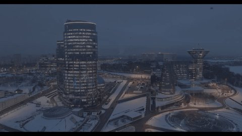 Drone Flying above Modern Business Center Winter