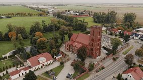 Picturesque Drone Flight over the Historic Church of St. Jadwigi in Pępowo, Wielkopolska, Poland - Autumn Scenery in the Warm Light of the Day - Powered by Shutterstock - Get 15% off with code: PIKWIZARD15