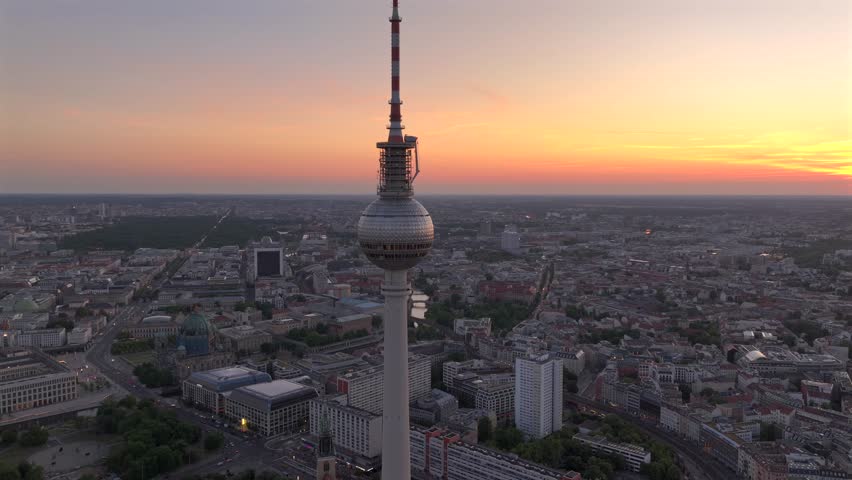 Alexanderplatz TV Tower Close Up View, Fernsehturm at Sunset Time in Berlin City Center, Aerial Parallax Drone Shot.