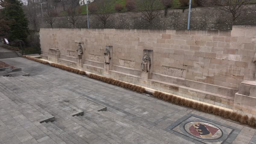 The Reformation Wall in Parc des Bastions in Geneva. towering statues of Protestant leaders. Geneve, Switzerland, Aerial