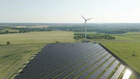 Wind turbine and solar panels generating clean power - Powered by Shutterstock - Get 15% off with code: PIKWIZARD15