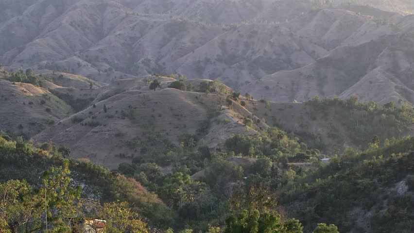 Petit-Goâve, Haiti - February 25 2019 - Panoramic view of the bald mountains at sunset, Petit-Goâve Bay