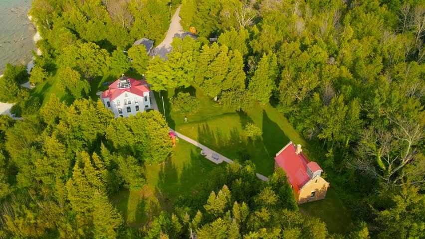 Aerial view of Leelanau state park, and Historic Grand Traverse lighthouse in Michigan up north.