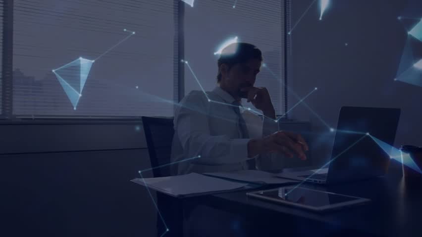 Mid-adult man talking on smartphone while glancing at laptop, generating tech globe from blue nodes. Technology, innovation, connectivity, data visualization, digital workspace, futuristic - Powered by Shutterstock - Get 15% off with code: PIKWIZARD15