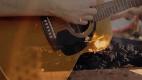 Guitarist picking acoustic guitar bringing flames while drummer tapping cymbals in music rehearsal. Performance, melody, sound, instrument, collaboration, creativity, energy - Powered by Shutterstock - Get 15% off with code: PIKWIZARD15