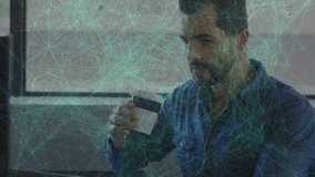 office worker reaching for to-go coffee cup, sipping and boosting productivity with tech overlay. Professional, innovation, modern, startup, concentration, work ethic, digital - Powered by Shutterstock - Get 15% off with code: PIKWIZARD15