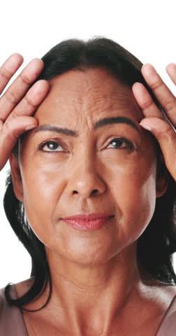 Skincare, inspection or woman in studio with wrinkles, concern or forehead check in anti aging. Face, dermatology or mature person on white background with lines, cosmetology or worry in facial care.