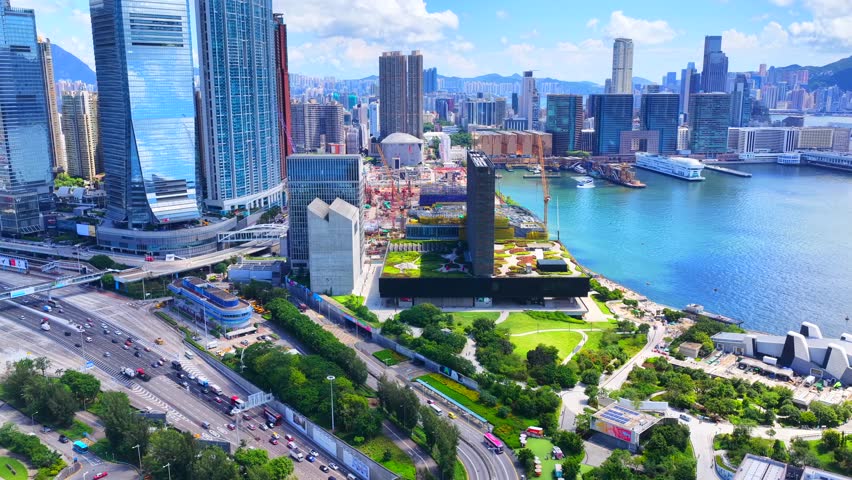 Aerial skyview of West Kowloon Cultural DistrictiHong Kong, a world class arts and cultural hub with Palace Museum performance venues green spaces waterfront promenade near High speed railway Station 