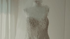 Ethereal wedding dress with floral embroidery and flowing fabric in soft light - Powered by Shutterstock - Get 15% off with code: PIKWIZARD15