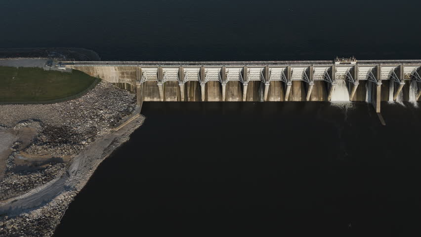 Concrete Dam Releasing Water Into River - Kerr Dam In Oklahoma, United States - Drone Shot